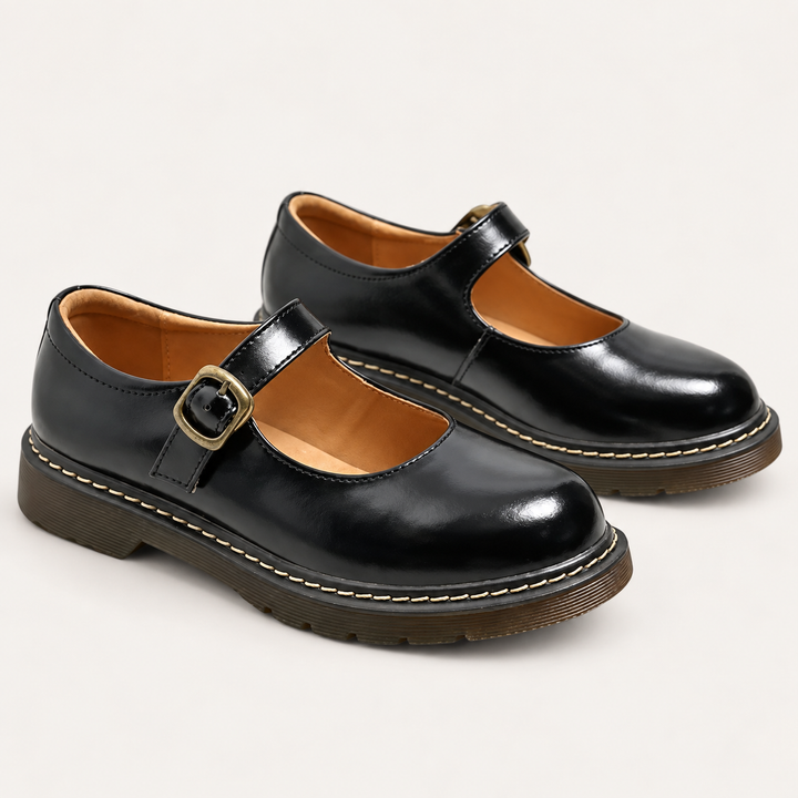 Bianca black Mary Jane shoes isolated, front three-quarter view