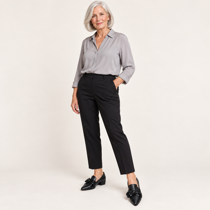 Elena black bow shoes styled on a mature model