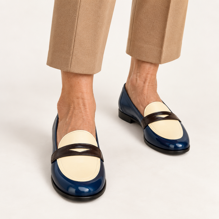 Elisa navy cream and brown loafers worn, close product view