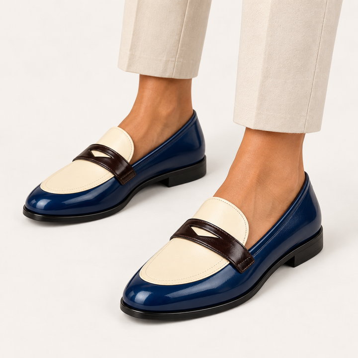 Elisa navy cream and brown loafers worn, clean studio three-quarter view