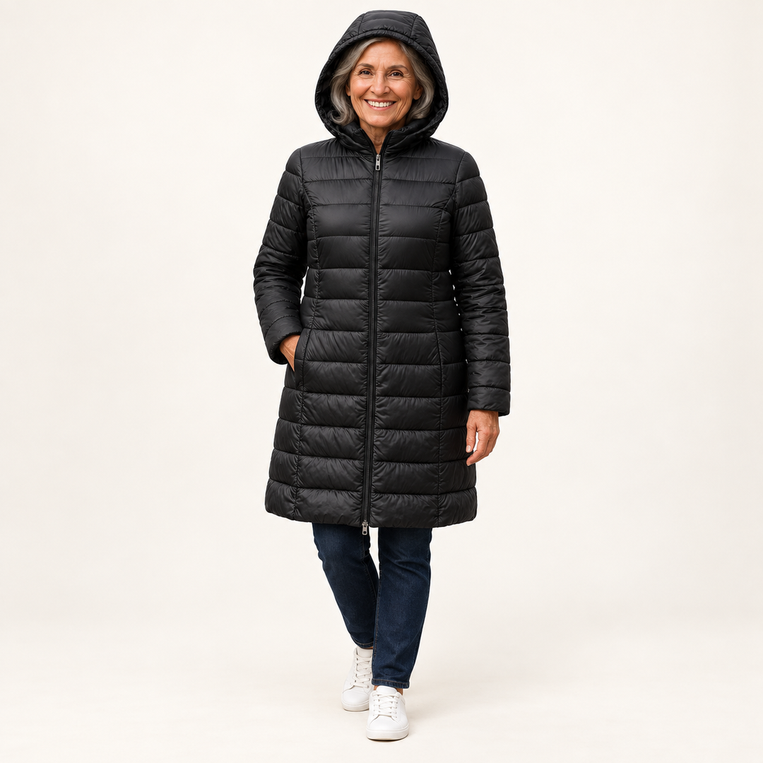 HELSA Black padded jacket — clean studio context on mature model