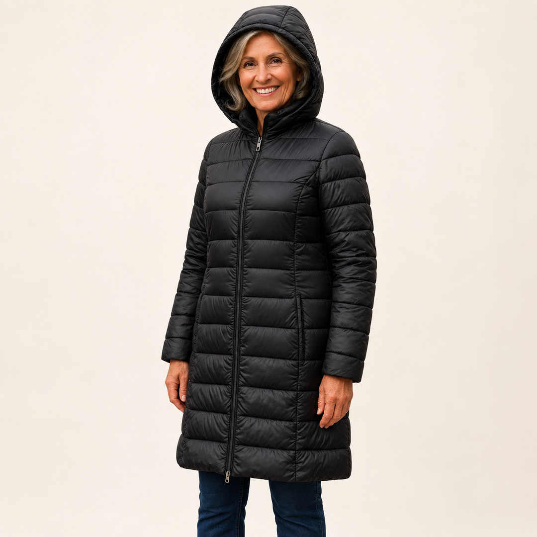 HELSA Black padded jacket on mature British model, three-quarter view