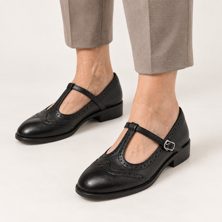 Irene brogue Mary Jane shoes in Black worn close-up