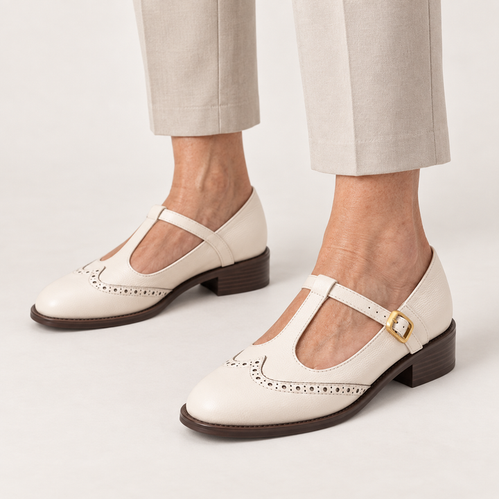 Irene brogue Mary Jane shoes in White worn close-up