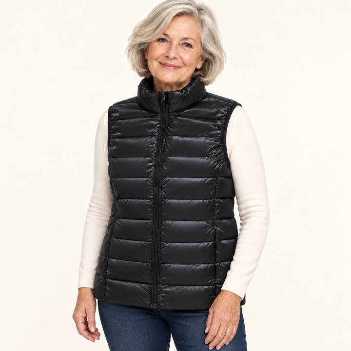 ISA Black padded gilet on mature model in clean studio