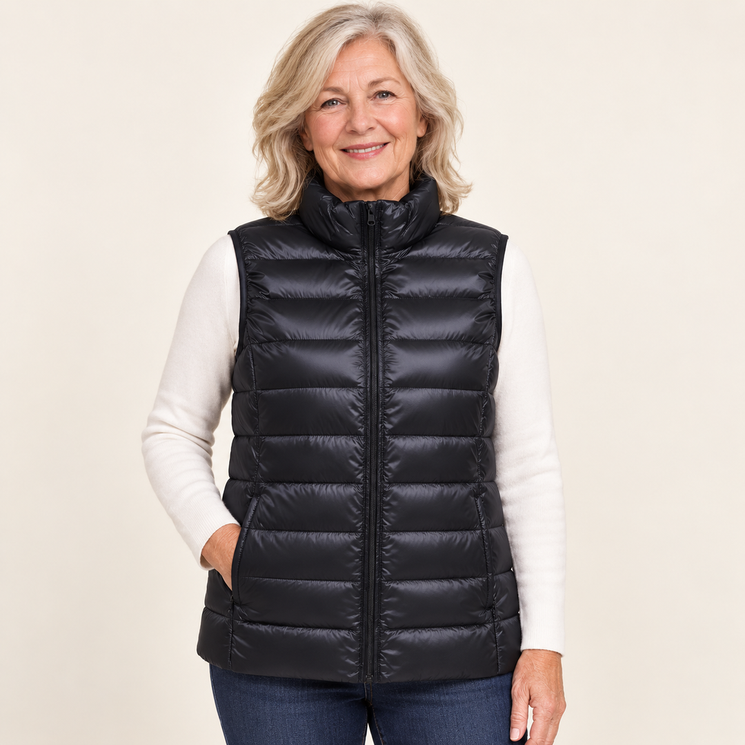 ISA Black padded gilet on mature model, front view