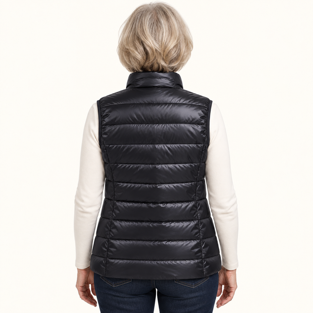 ISA Black padded gilet on mature model, back view