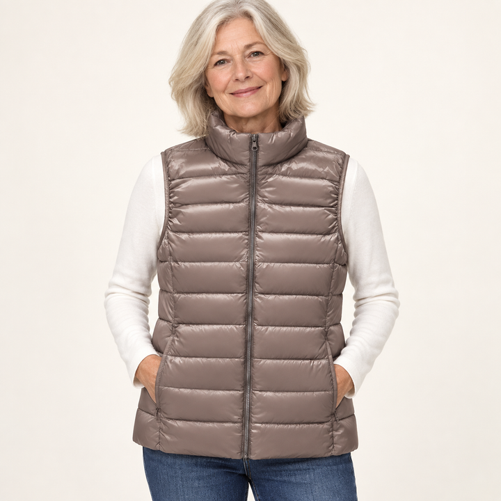 ISA Champagne padded gilet on mature model, front view