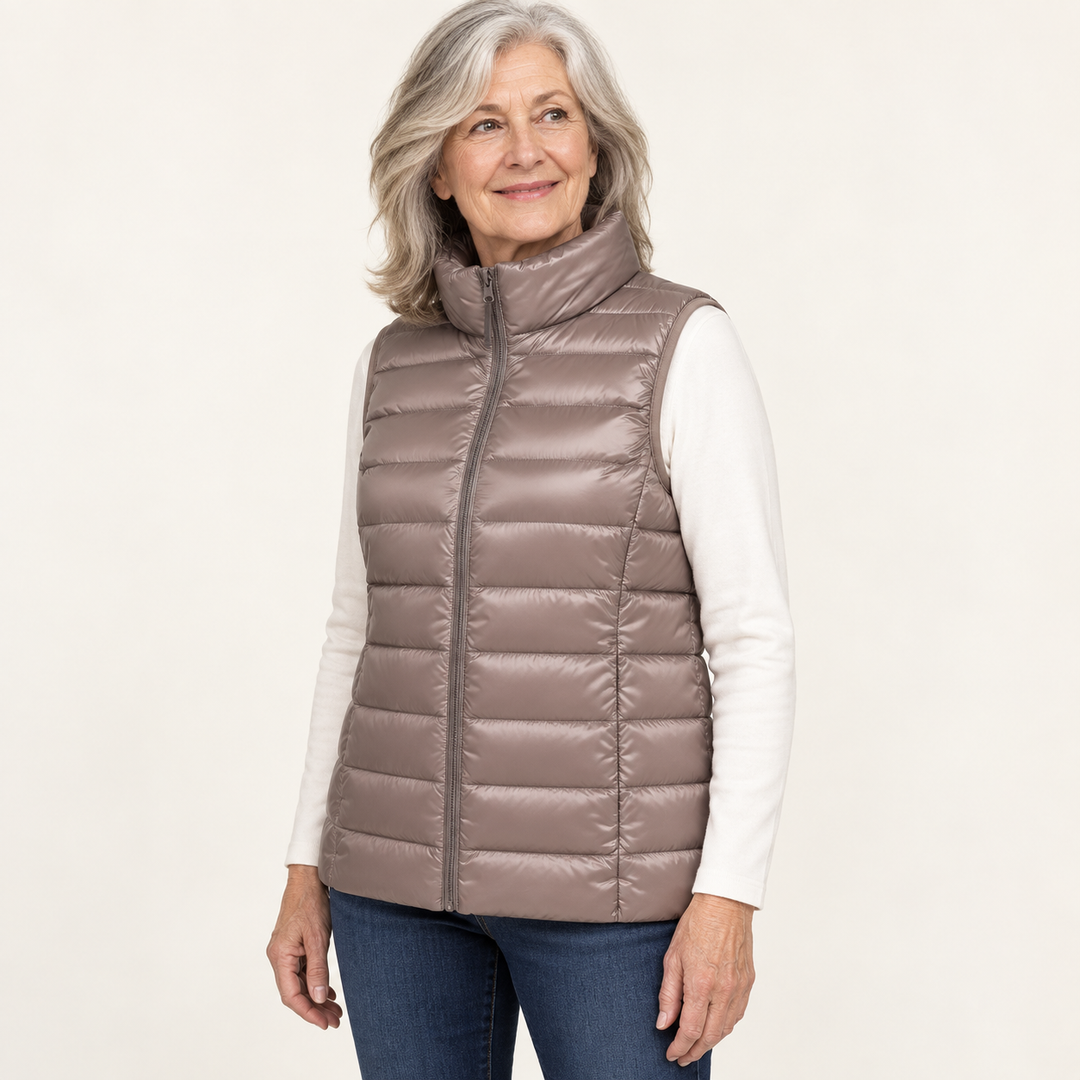 ISA Champagne padded gilet on mature model, three-quarter view