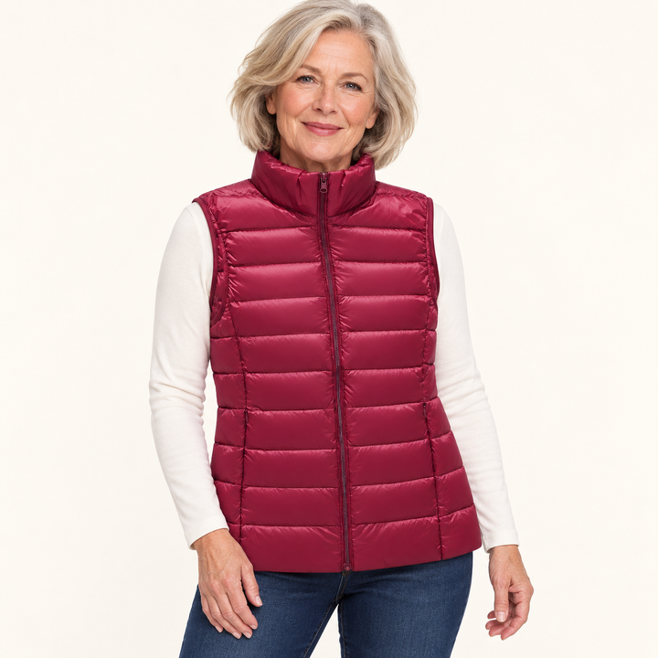ISA Dark Red padded gilet on mature model in clean studio