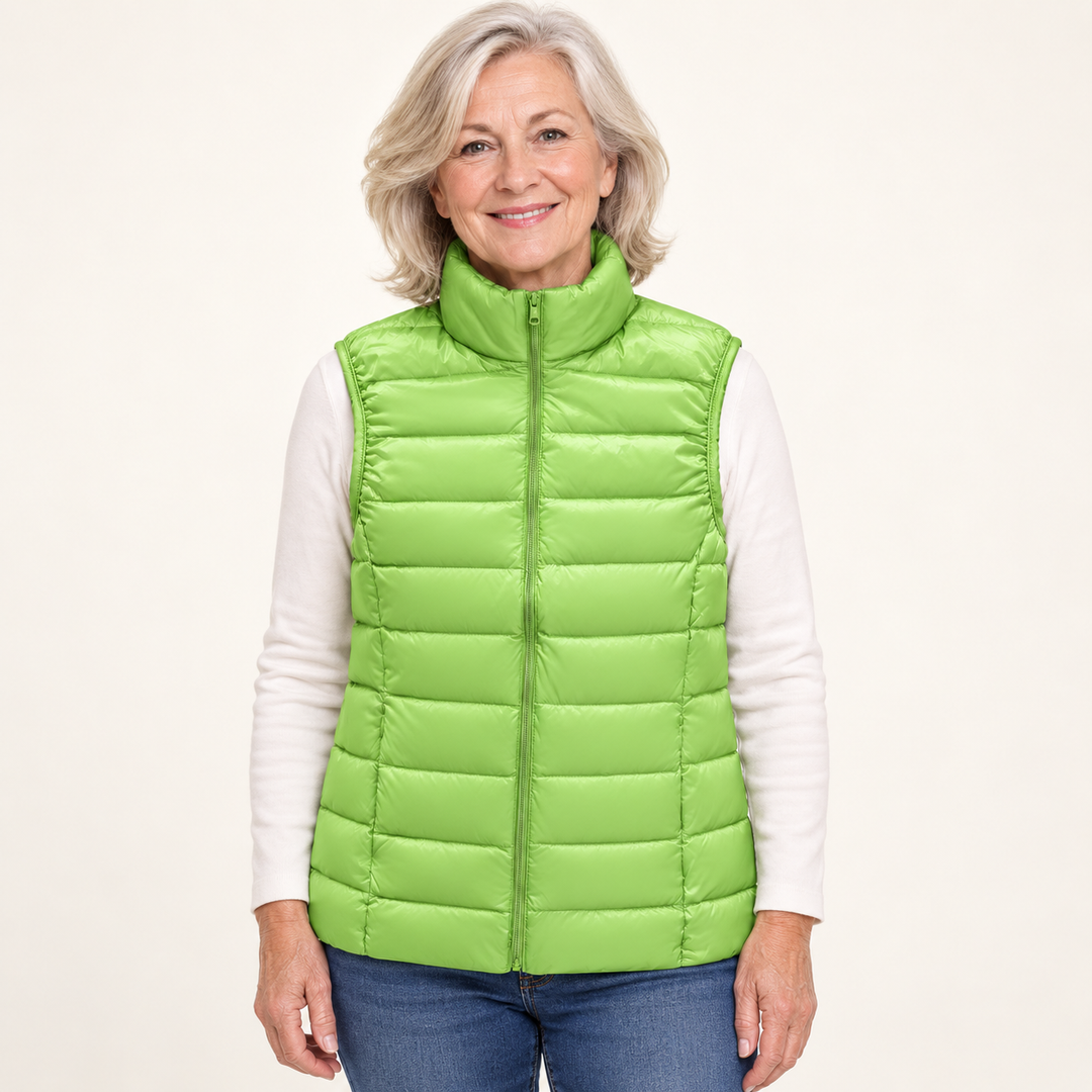 ISA Green padded gilet on mature model, front view