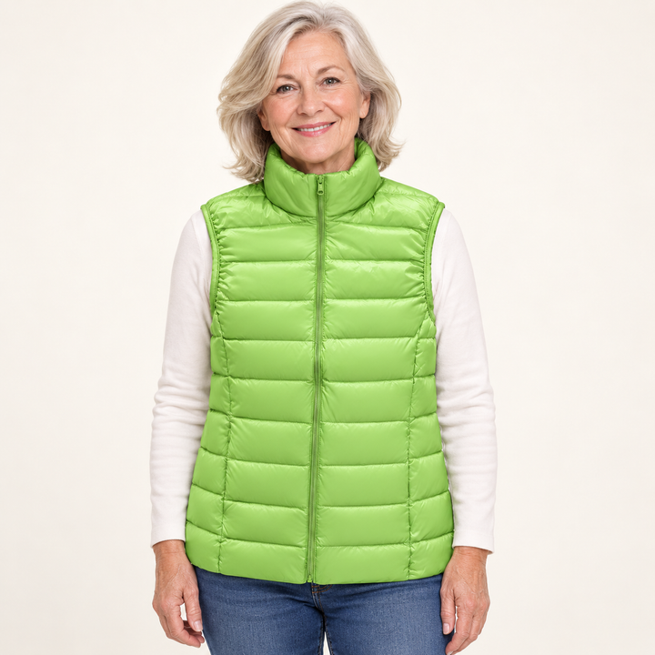 ISA Green padded gilet on mature model, front view