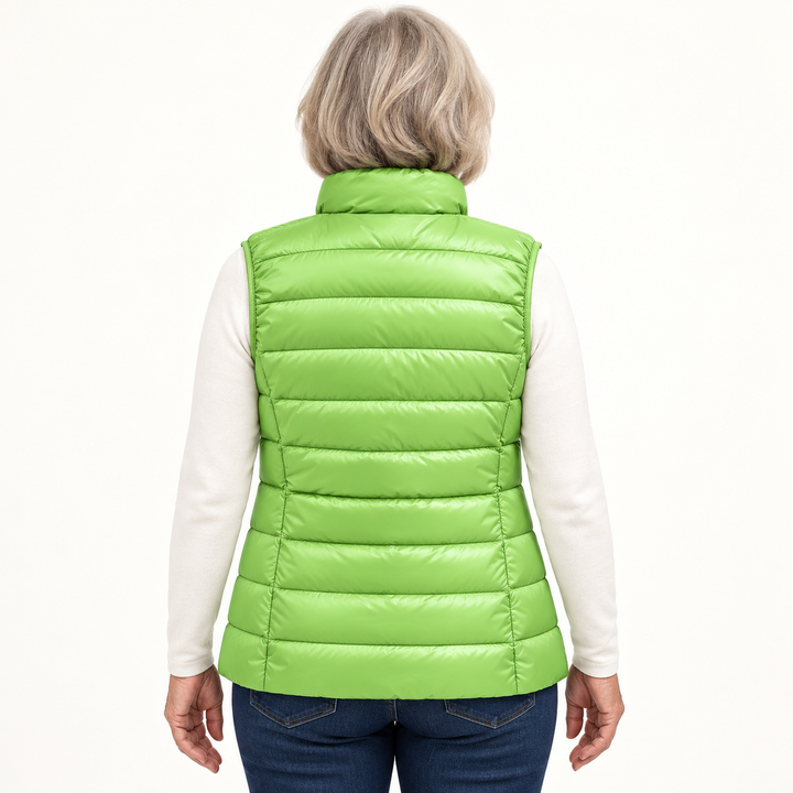 ISA Green padded gilet on mature model, back view