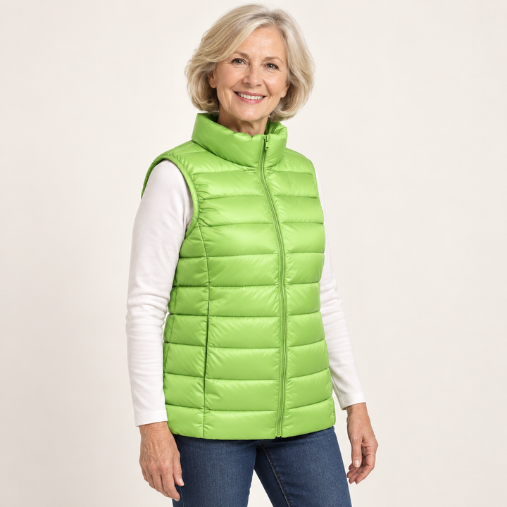 ISA Green padded gilet on mature model, three-quarter view