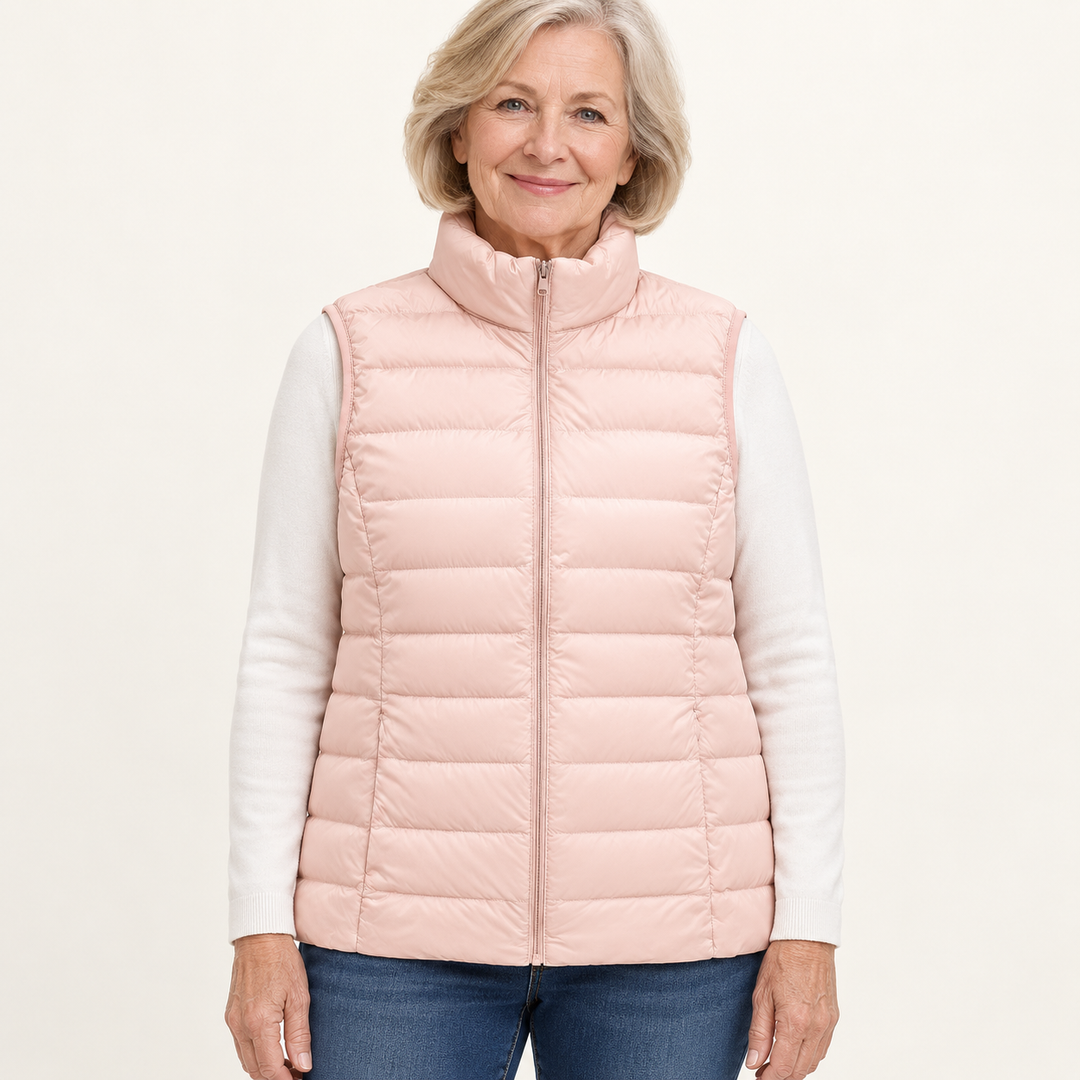 ISA Light Pink padded gilet on mature model, front view