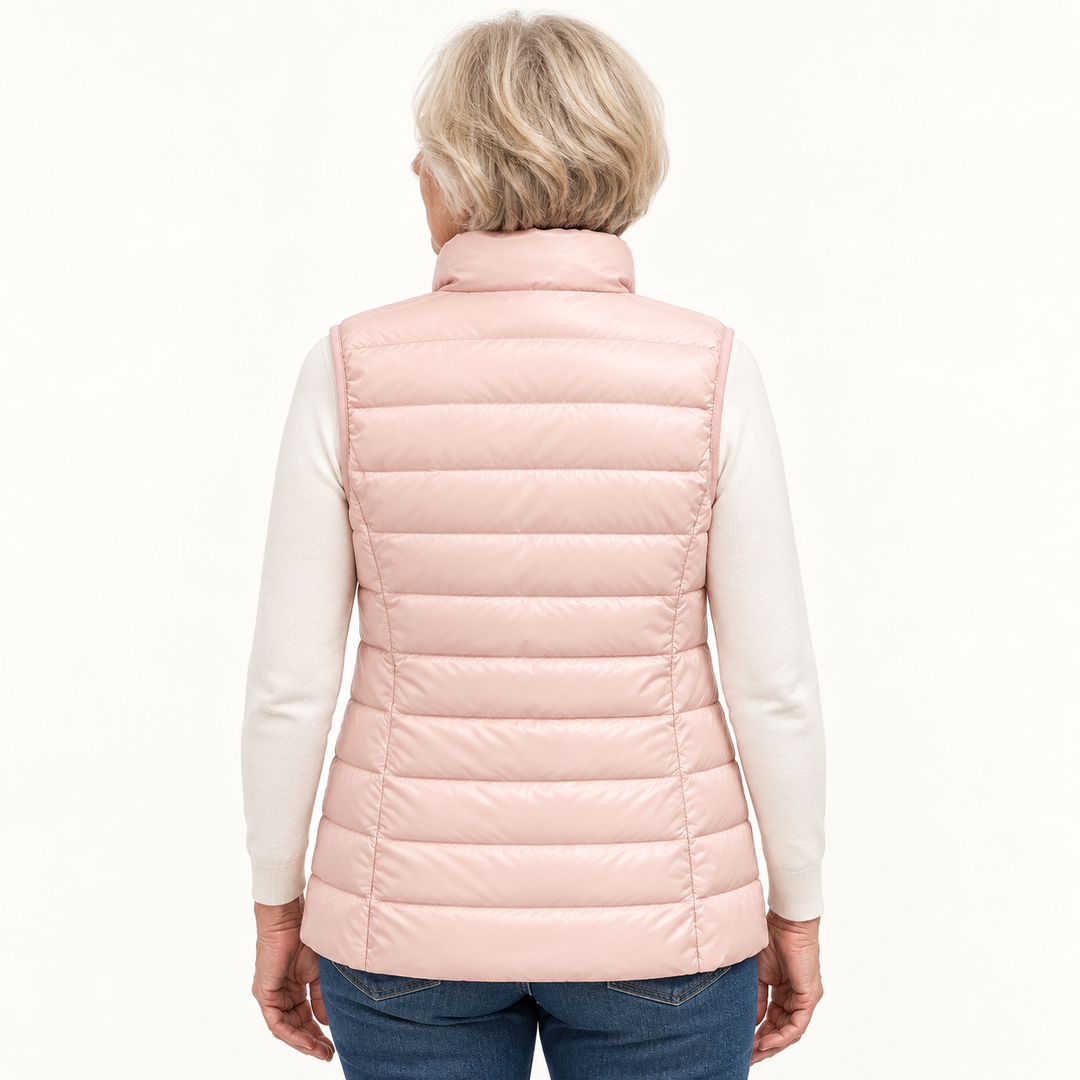ISA Light Pink padded gilet on mature model, back view