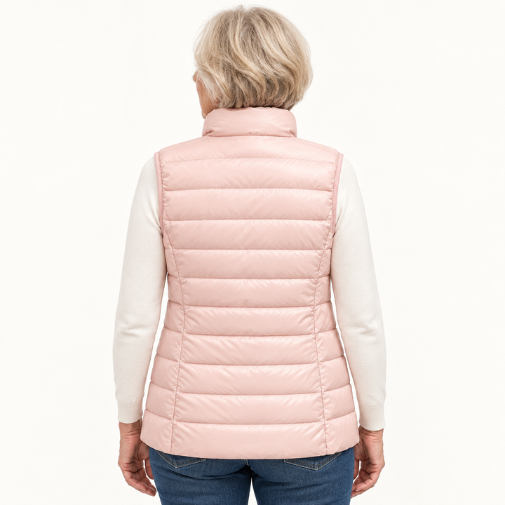 ISA Light Pink padded gilet on mature model, back view