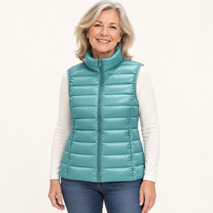 ISA Mint Green padded gilet on mature model in clean studio