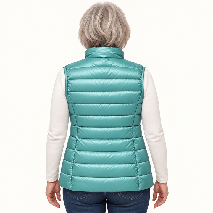 ISA Mint Green padded gilet on mature model, back view