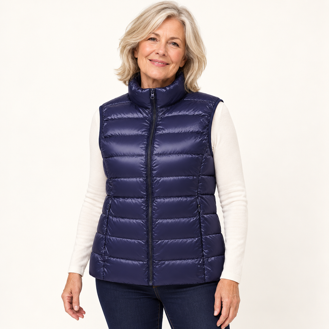 ISA Navy Blue padded gilet on mature model in clean studio