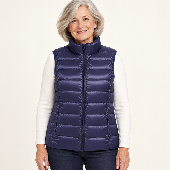 ISA Navy Blue padded gilet on mature model, front view