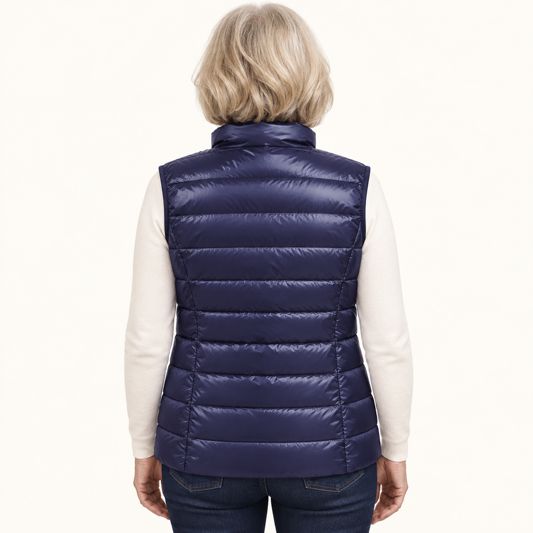 ISA Navy Blue padded gilet on mature model, back view