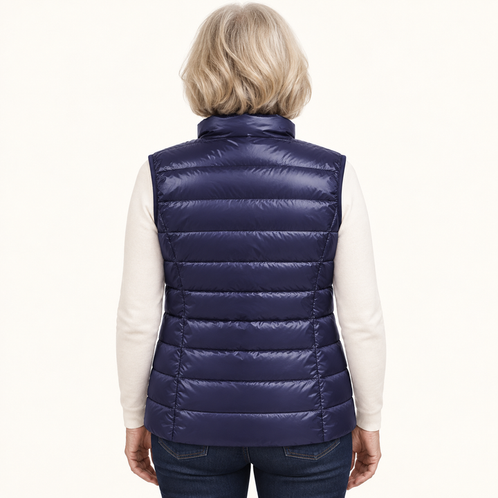 ISA Navy Blue padded gilet on mature model, back view