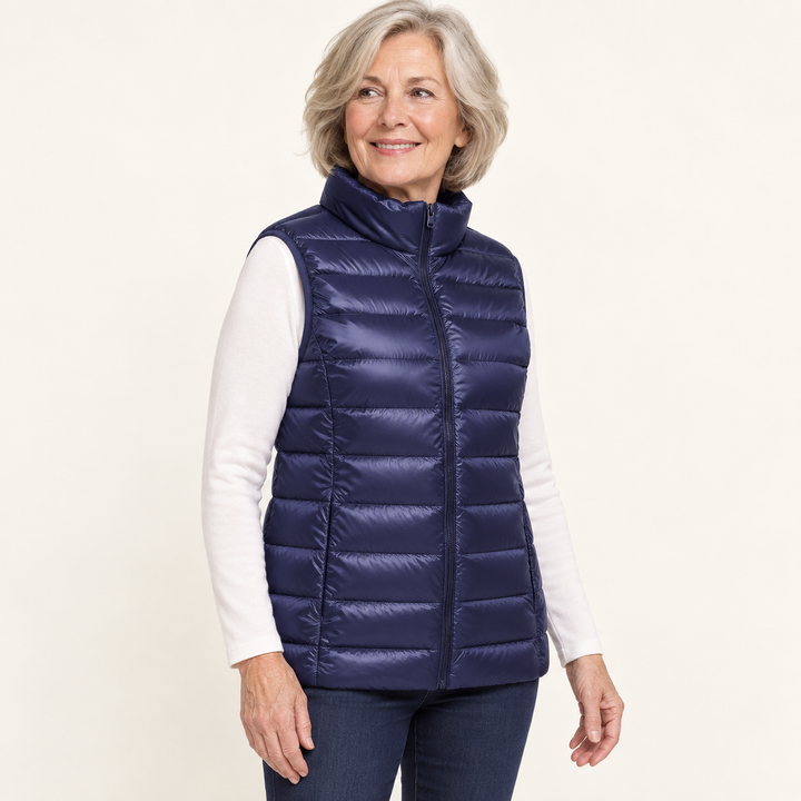 ISA Navy Blue padded gilet on mature model, three-quarter view