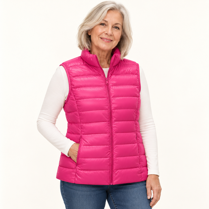 ISA Pink padded gilet on mature model in clean studio