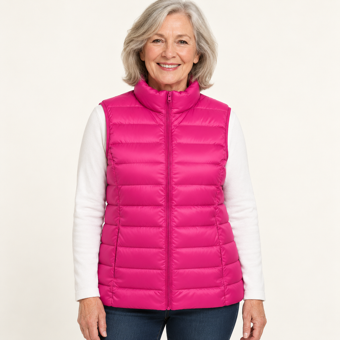 ISA Pink padded gilet on mature model, front view