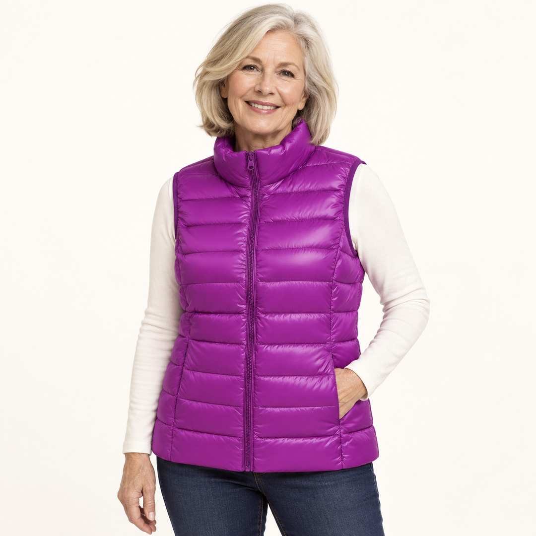 ISA Purple padded gilet on mature model in clean studio