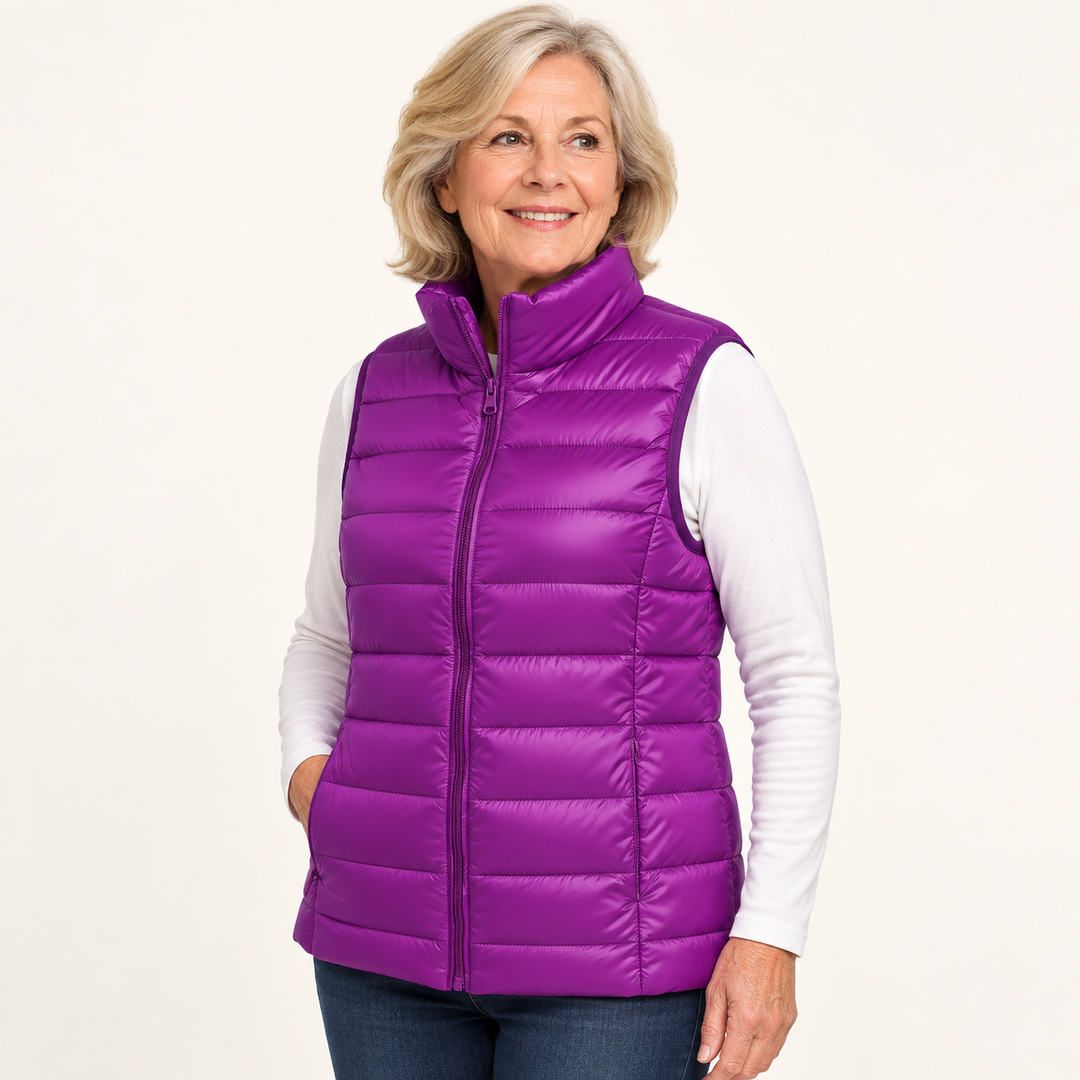 ISA Purple padded gilet on mature model, three-quarter view