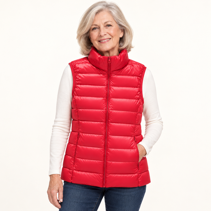 ISA Red padded gilet on mature model in clean studio