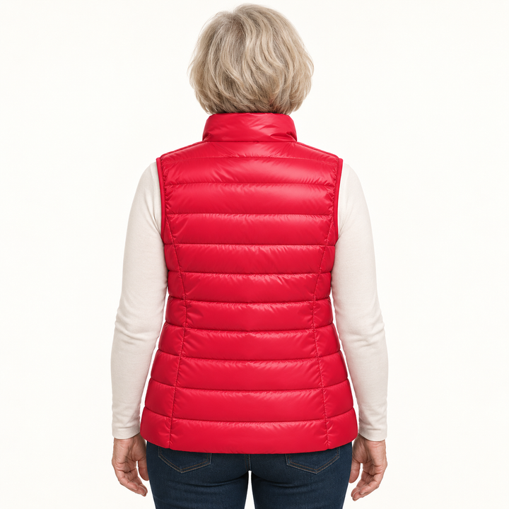 ISA Red padded gilet on mature model, back view