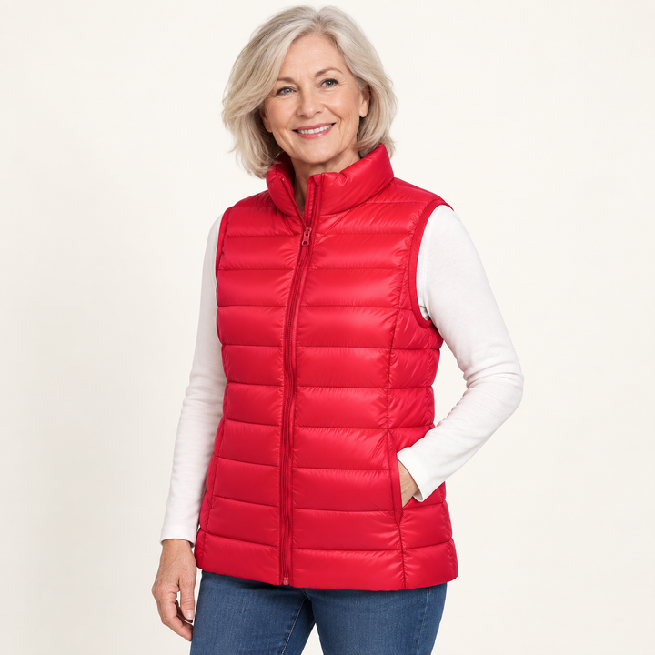 ISA Red padded gilet on mature model, three-quarter view