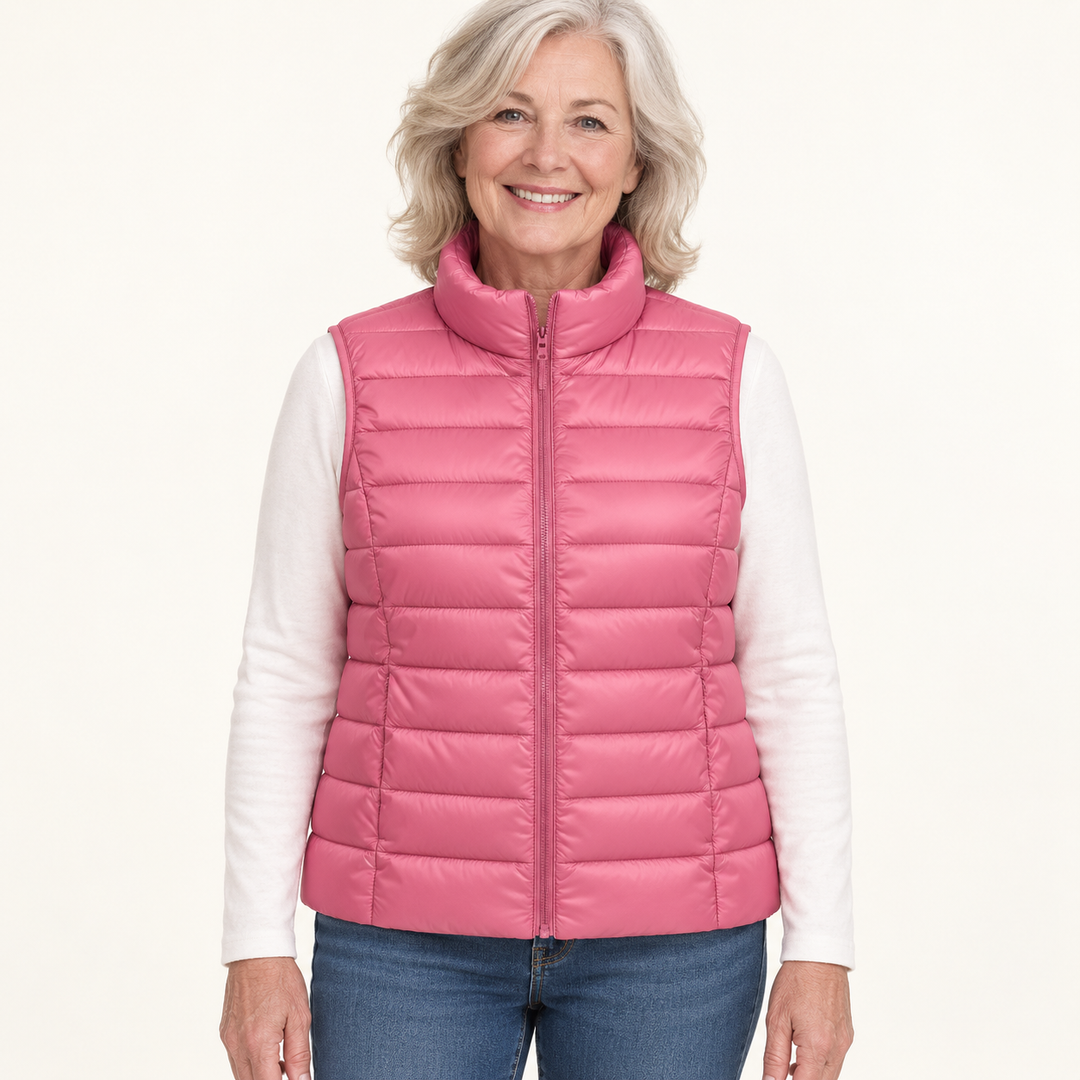 ISA Salmon padded gilet on mature model, front view