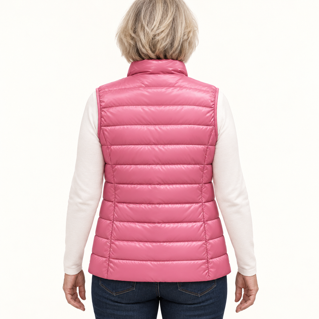 ISA Salmon padded gilet on mature model, back view