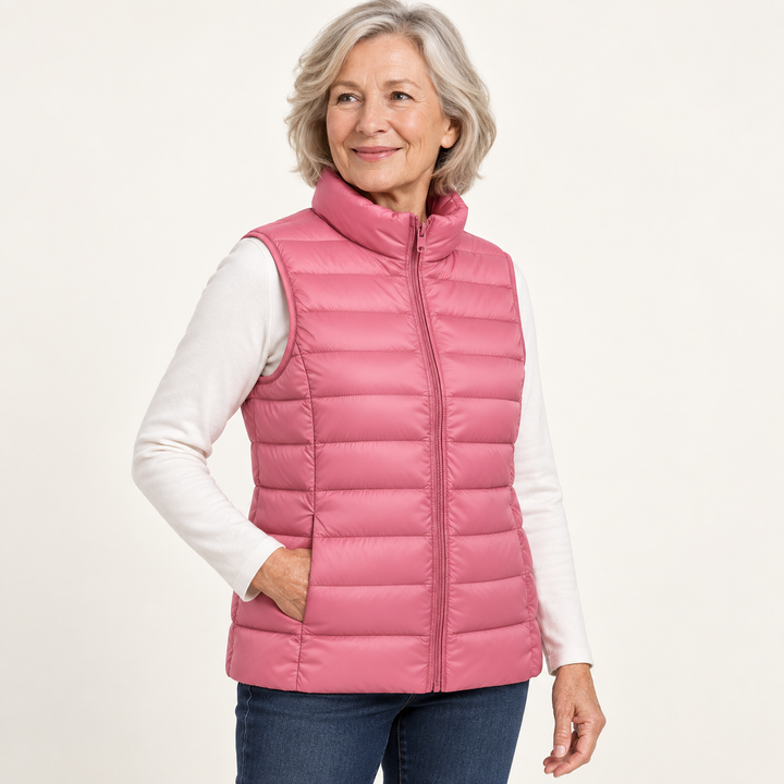 ISA Salmon padded gilet on mature model, three-quarter view