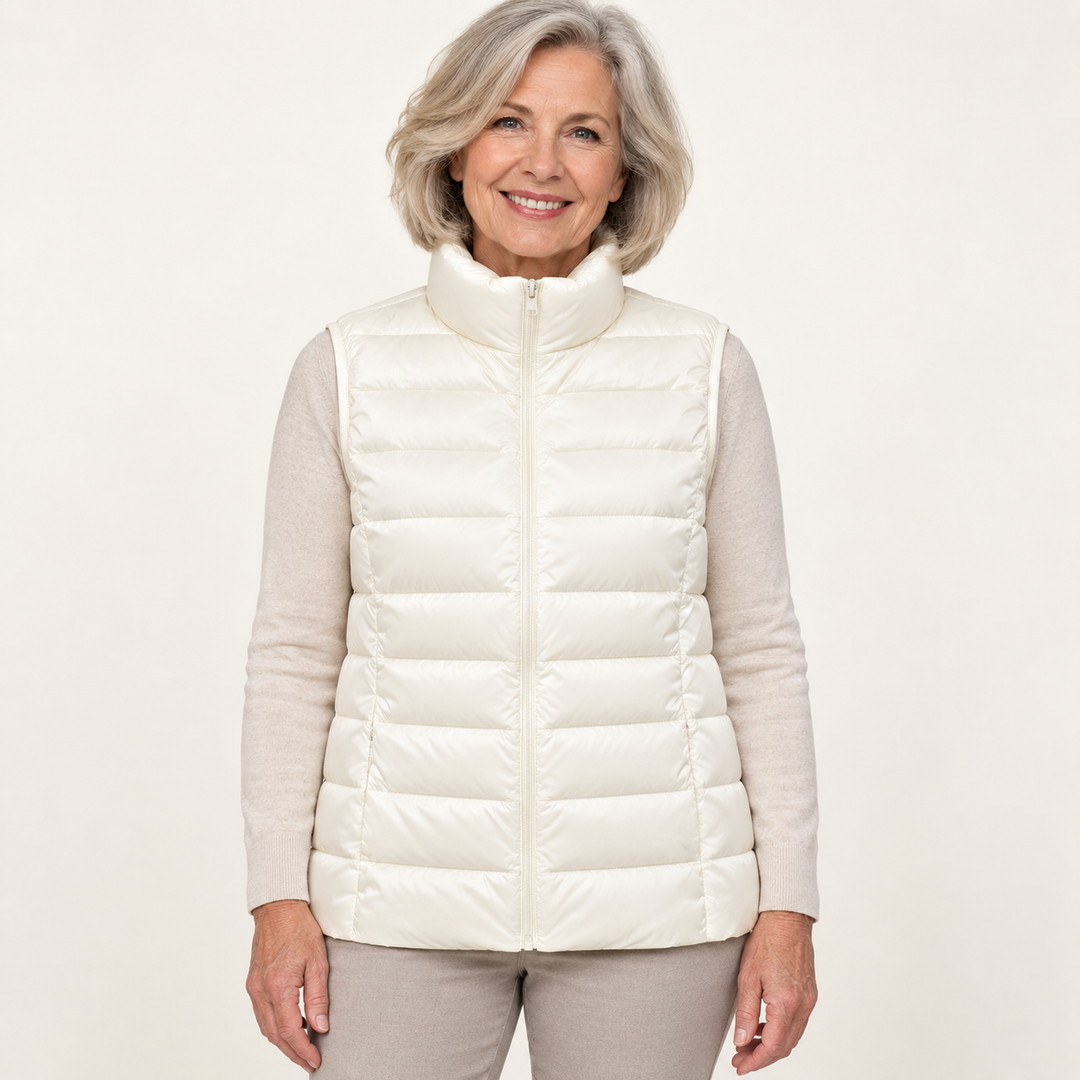 ISA White padded gilet on mature model, front view