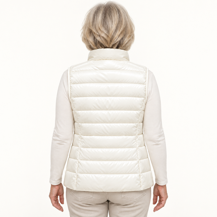 ISA White padded gilet on mature model, back view