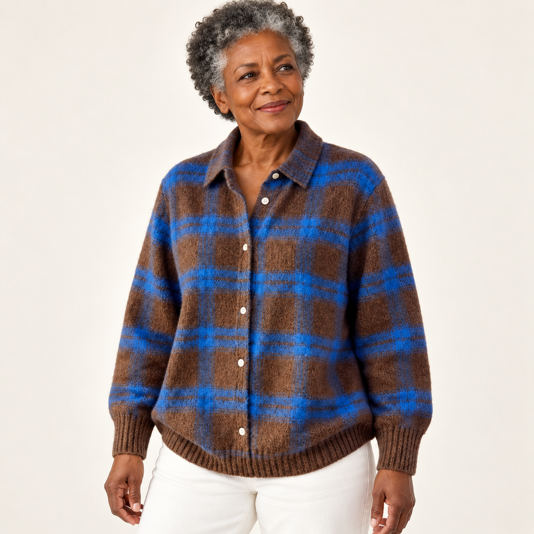 LIZZA checked knit shirt worn by a mature British woman in a three-quarter studio view