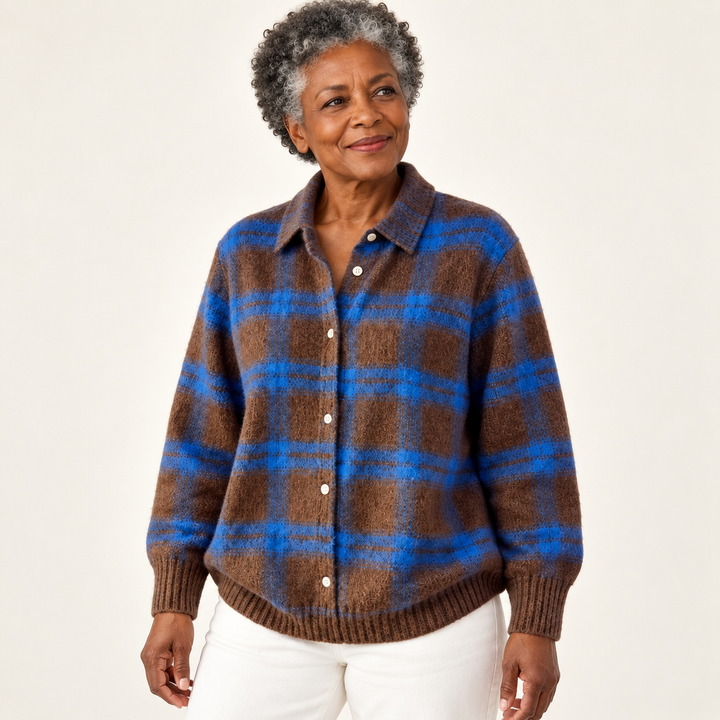 LIZZA checked knit shirt worn by a mature British woman in a three-quarter studio view