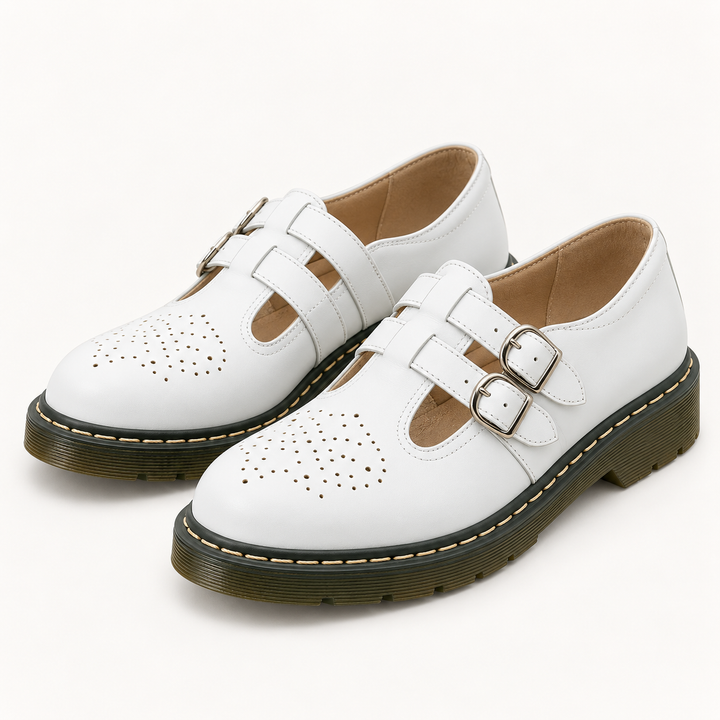 Luna white double-buckle shoes, isolated front three-quarter view