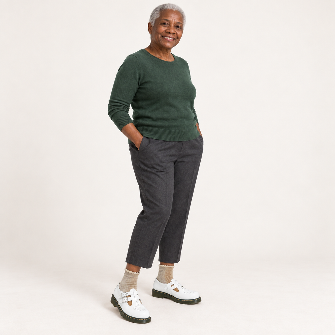 Luna white shoes worn by a mature Black British woman