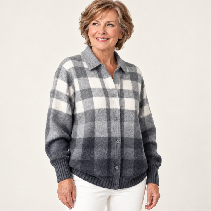 MARIELLE grey checked knit shirt worn by a mature British woman in a three-quarter studio view