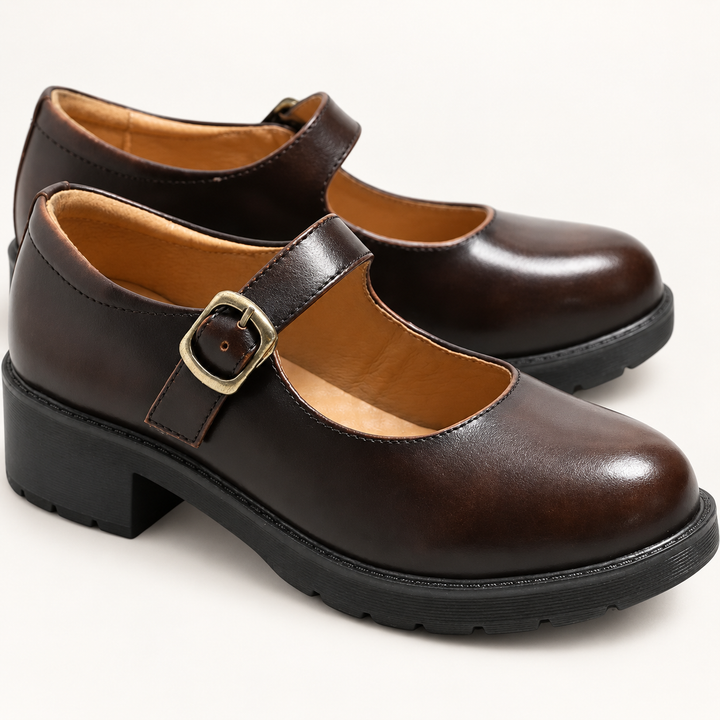 Marta dark brown Mary Jane shoes isolated front three-quarter view
