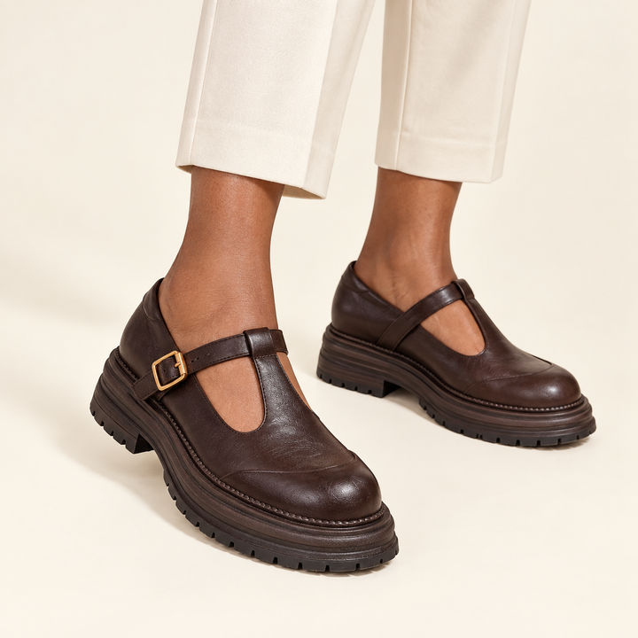 Brown T-strap Mary Jane shoes worn, product-focused main view