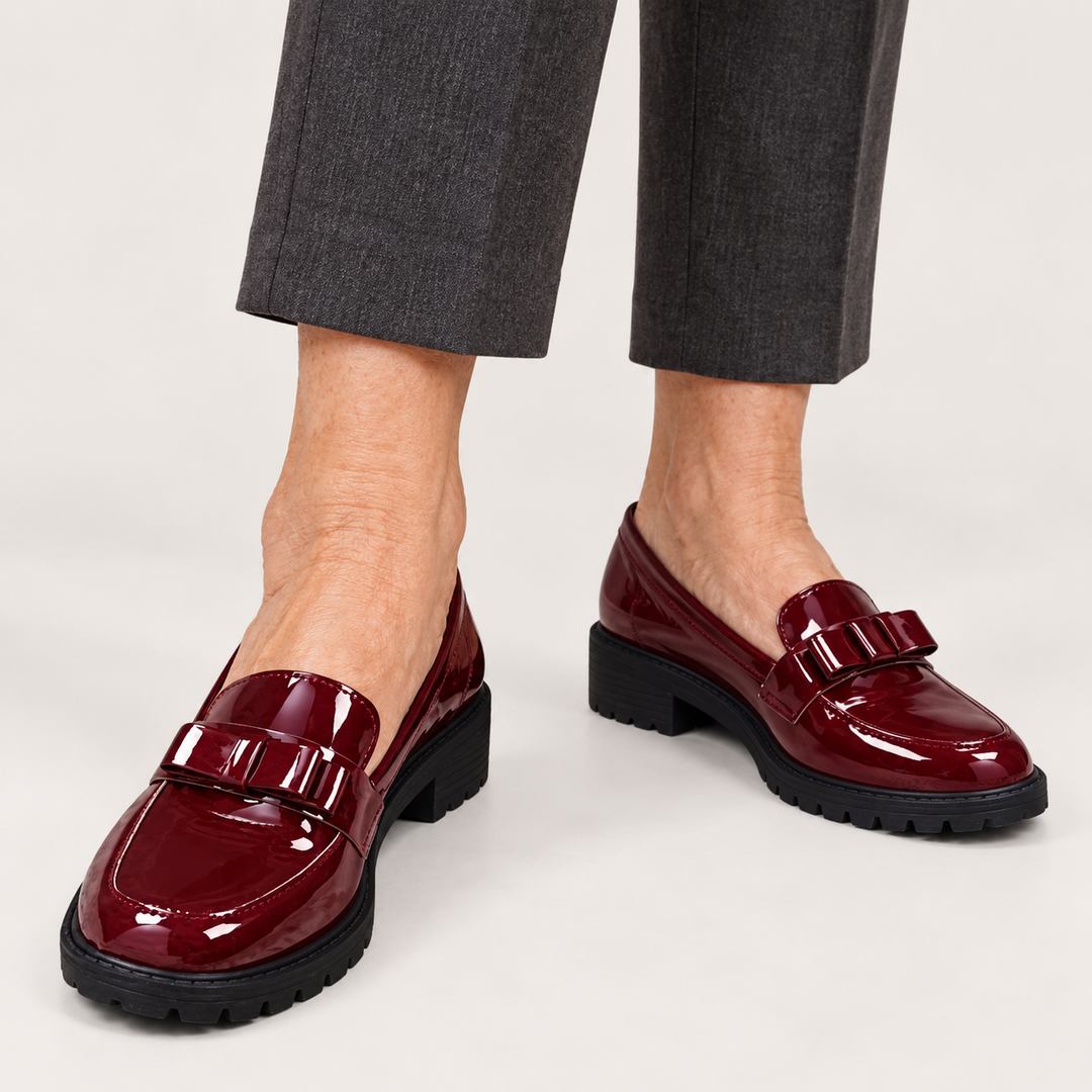 Maya Burgundy patent bow loafers worn, close product view