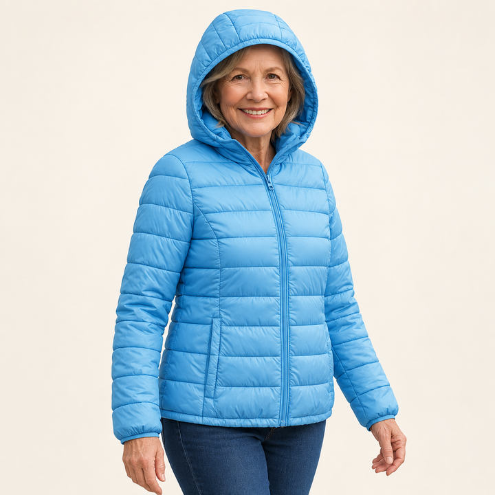 METTA Baby Blue padded jacket on mature model, three-quarter view