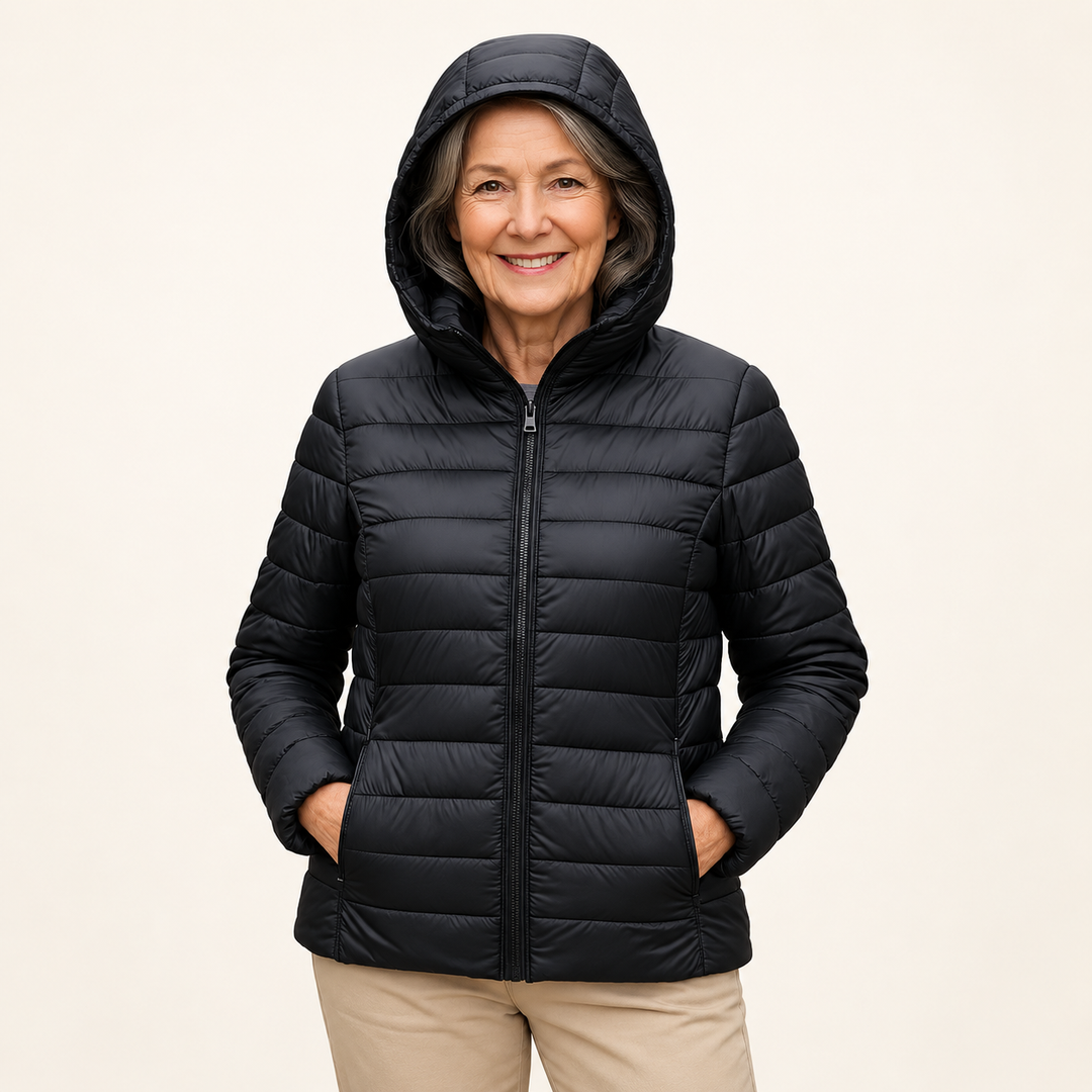 METTA Black padded jacket on mature model in clean studio